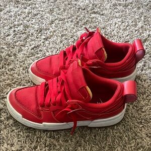 Nike Red Sneakers with Chunky Sole and Breathable Design